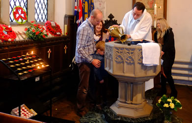 Photo of the baptismal font being filled at St Paul's Church Winlaton